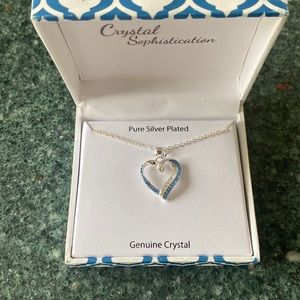 Silver necklace with crystal heart pendant . New.